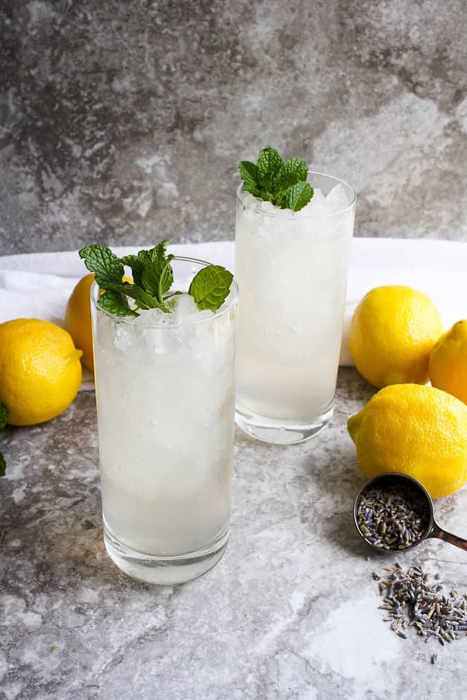 lavender lemonade in glasses with mint