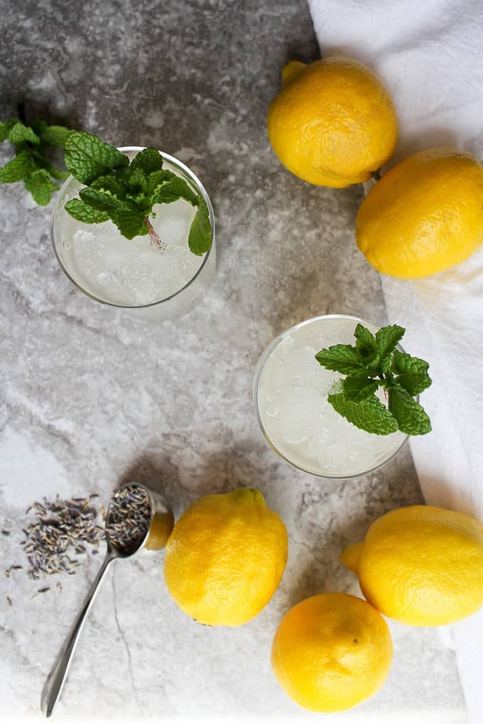 lavender lemonade in glasses with mint