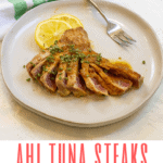 These easy seared ahi tuna steaks are seasoned with sesame seeds and a ginger soy sauce marinade. This extra-quick main course is ready in 20 minutes!
