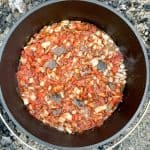 Add Tomatoes to the Dutch Oven