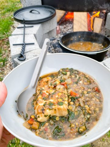 campfire fish lentil stew in a bowl