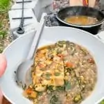 campfire fish lentil stew in a bowl