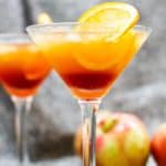 This Apple Cider Kentucky Sunrise is made with bourbon, apple cider, and pomegranate simple syrup. This southern twist on the classic Tequila Sunrise is the perfect fall cocktail.