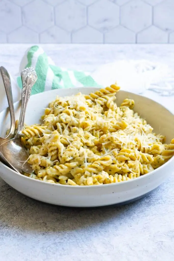 pesto mac and cheese in a serving dish