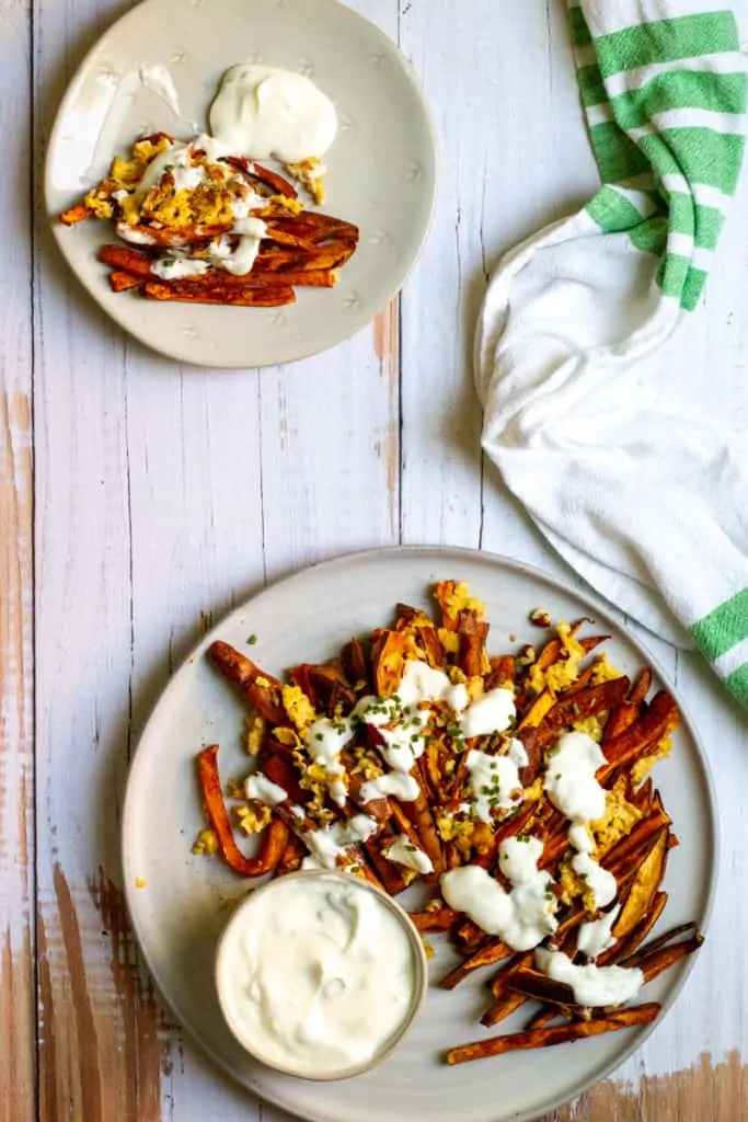 loaded sweet potato fries on a serving platter