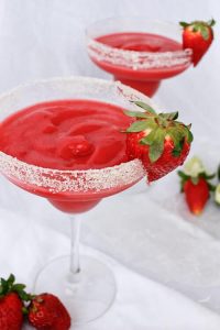 These Frozen Strawberry Rhubarb Margaritas use rhubarb simple syrup and frozen strawberries for a cold and delicious spring cocktail!
