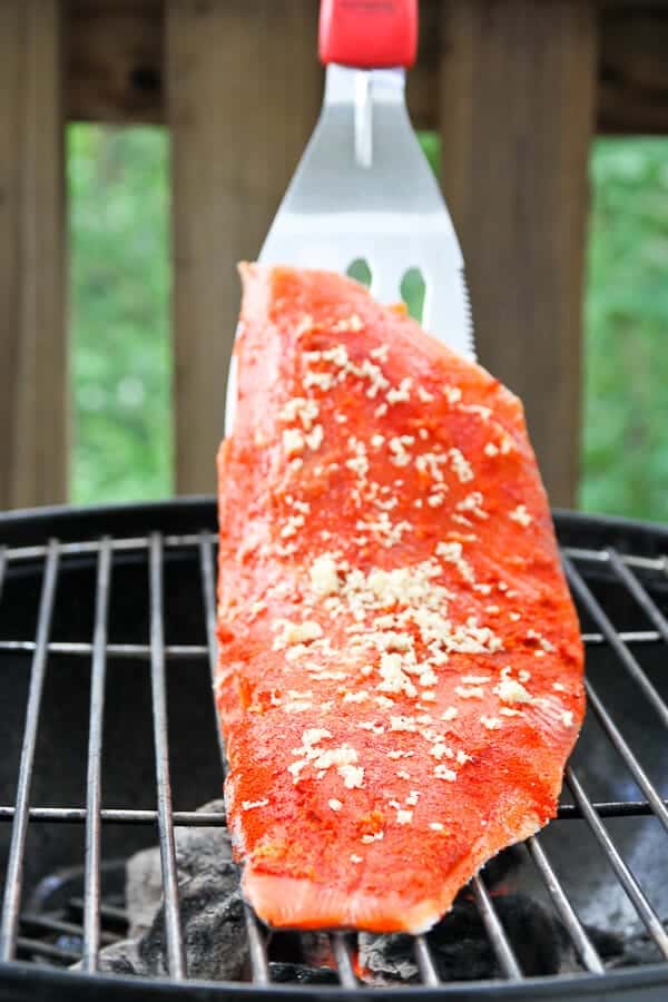 This Grilled Chili Ginger Salmon with Strawberry Salsa is sweet, savory, and spicy! Make this grilled salmon the centerpiece at your next cookout!