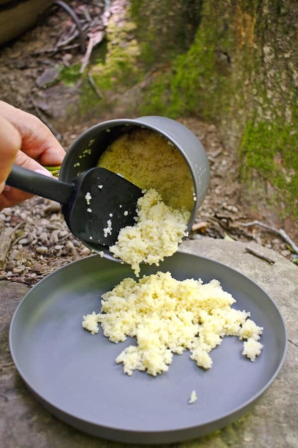 Pouring Couscous onto a Plate