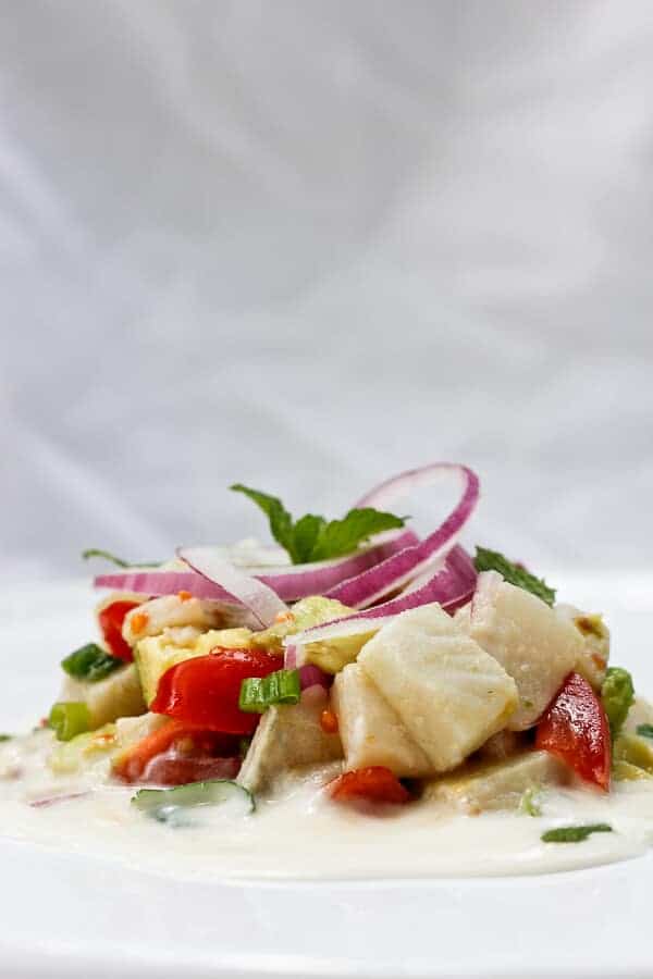 Grapefruit Flounder Ceviche Served with Sauce Underneath