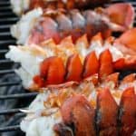 This simple Grilled Lobster Tail recipe walks you through how to cook lobster tails on the grill. Serve these with the easy bourbon sauce for a date night dinner!