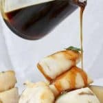 Grilled Scallops with Bourbon Sauce: This easy seafood recipe features sea scallops cooked on skewers, with a butter bourbon sauce.