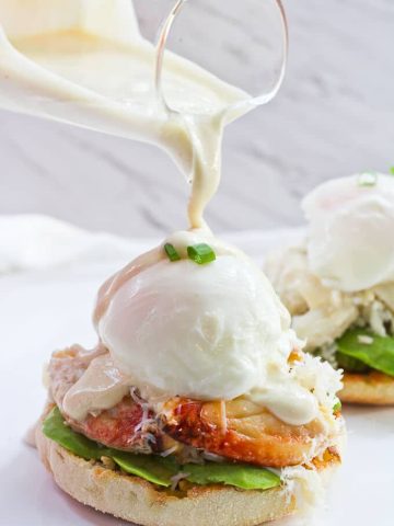 This Healthy Crab Eggs Benedict is made with Dungeness crab legs, a poached egg, and a creamy yogurt sauce, and is a lighter take on the breakfast classic!