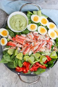 This Grilled King Crab Salad with Creamy Avocado is delicious at home or at a picnic, and is a light, refreshing, and healthy seafood salad!