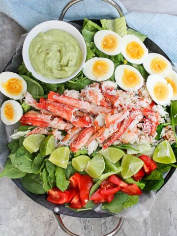 This Grilled King Crab Salad with Creamy Avocado is delicious at home or at a picnic, and is a light, refreshing, and healthy seafood salad!