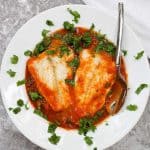 This easy Pumpkin Cod Curry is made with a spiced pumpkin and tomato sauce, fresh spinach, and gently poached cod.