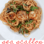 Scallop Fra Diavolo is made with tomato sauce tossed with spaghetti and seared spicy sea scallops. Serve it as a delicious date night dinner!