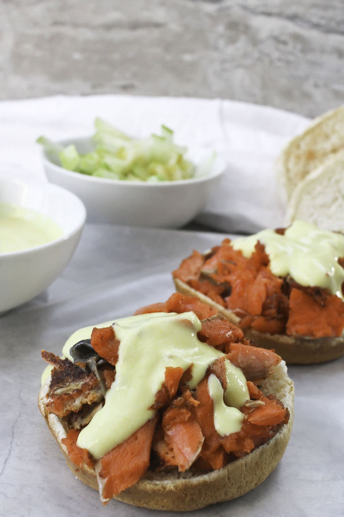 two open-faced salmon sandwiches.