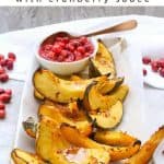 This vegan-friendly Maple Syrup Roasted Acorn Squash with Cranberry Sauce is an easy side dish that only requires a few minutes of hands-on work, and is perfect for fall! #Maple #AcornSquash #CranberrySauce #Vegan