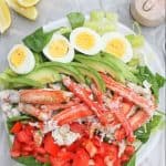 {ad} This King Crab Louie Salad is a lighter version of the classic Crab Louie (or Crab Louis), and is topped with steamed king crab and a spicy yogurt dressing. #kingcrab #yogurt #seafood #crablouie