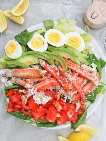 This King Crab Louie Salad is a lighter version of the classic Crab Louie, and is topped with steamed king crab and a spicy yogurt dressing.