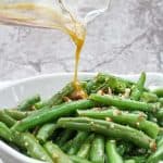 This vegetarian Green Bean Salad with Almonds is made with fresh green beans, almonds, and an quick homemade honey mustard dressing.  Serve it warm or cold for an easy side dish!
