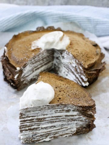 crepe cake with piece cut out.
