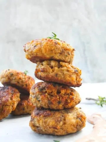 Sardine Fish Cakes in a stack with sauce on the serving tray