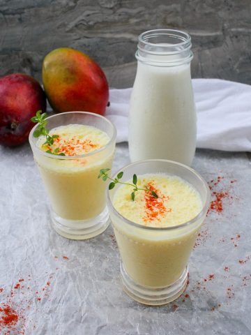 mango lassi with kefir in juice glasses