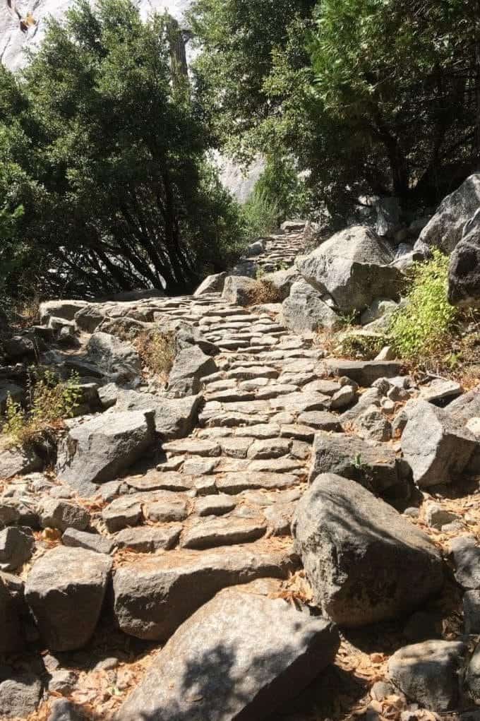 Rock steps leading up hill on Yosemite trail.