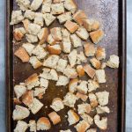 toasting breadcrumbs on a baking sheet