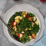 kale apple salad in a serving bowl