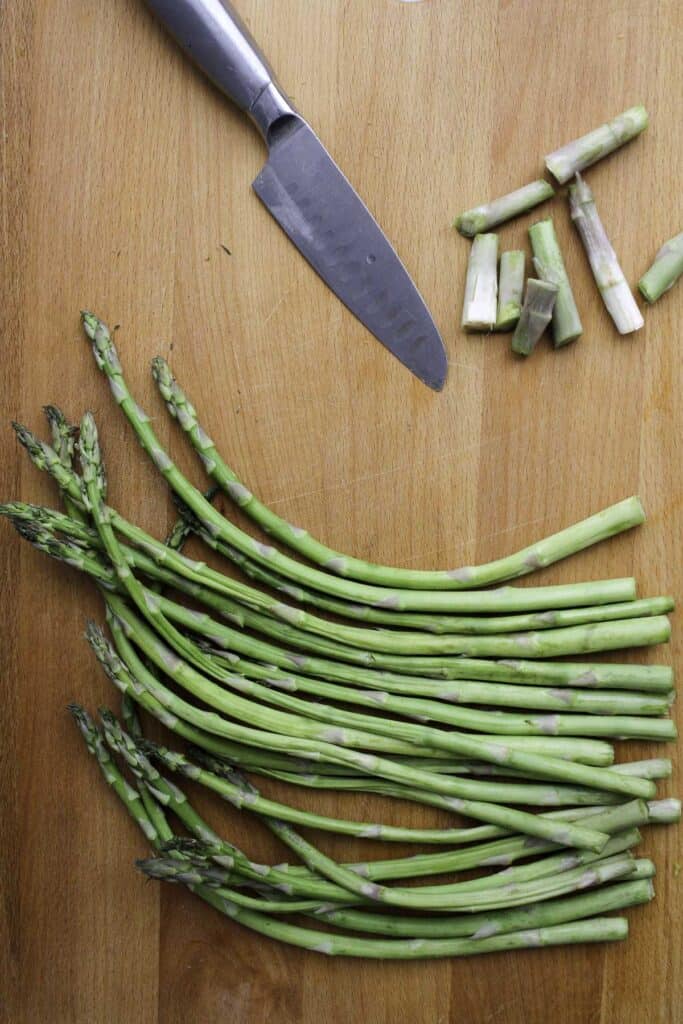 asparagus on a cutting board.