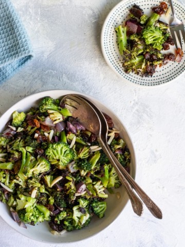 This vegan broccoli raisin salad is tossed with roasted onion almonds, and a mustard vinaigrette for an easy and healthy make-ahead side dish!