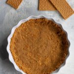 This easy vegan graham cracker crust is quick, only uses 3 ingredients, and looks and tastes infinitely better than store bought crust!