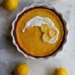 This easy lemon pie is a tart dessert made with whole lemons! Simply blend the filling ingredients together in a blender, bake, and serve!﻿