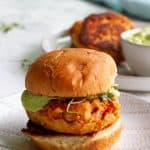 These easy salmon burgers are made with canned salmon, yogurt, breadcrumbs, and a few easy-to-find seasonings. Serve them with a quick and easy avocado sauce!