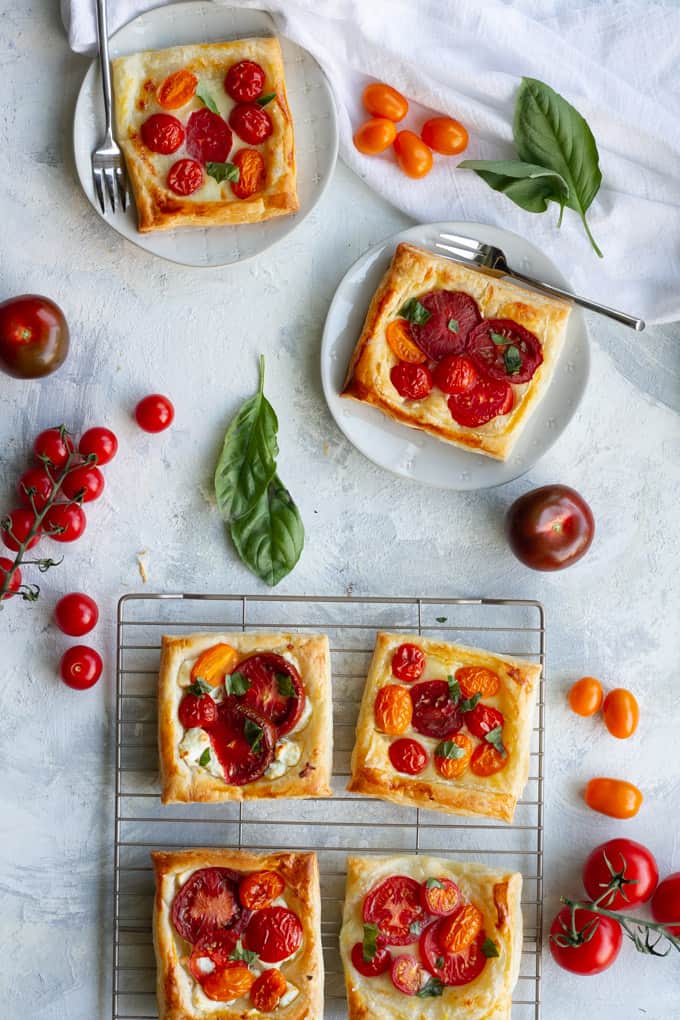 puff pastry tomato tarts on a cooling rack