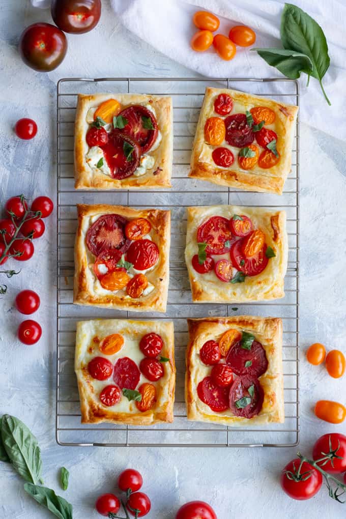 puff pastry tomato tarts on a cooling rack