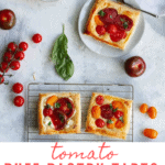 This easy tomato tart recipe is made with garden fresh herbs, summer tomatoes, soft cheese, and golden puff pastry. Make it with mozzarella, goat cheese, or Brie! Ready in 20 minutes!