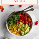 This fresh and easy tomato corn salad is a perfect summer side dish! Simply toss together roasted corn, tomatoes, avocado, herbs, and an easy vinaigrette.