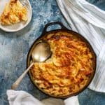 This gluten-free gratin dauphinois recipe is based on Julia Child's recipe for French scalloped potatoes, and is made with milk and freshly grated cheese.