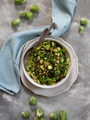 honey baslamic brussels sprouts in a serving bowl