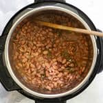 Pressure cook the beans until tender