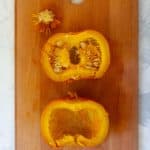 Cut the Pumpkin in Half + Remove Seeds