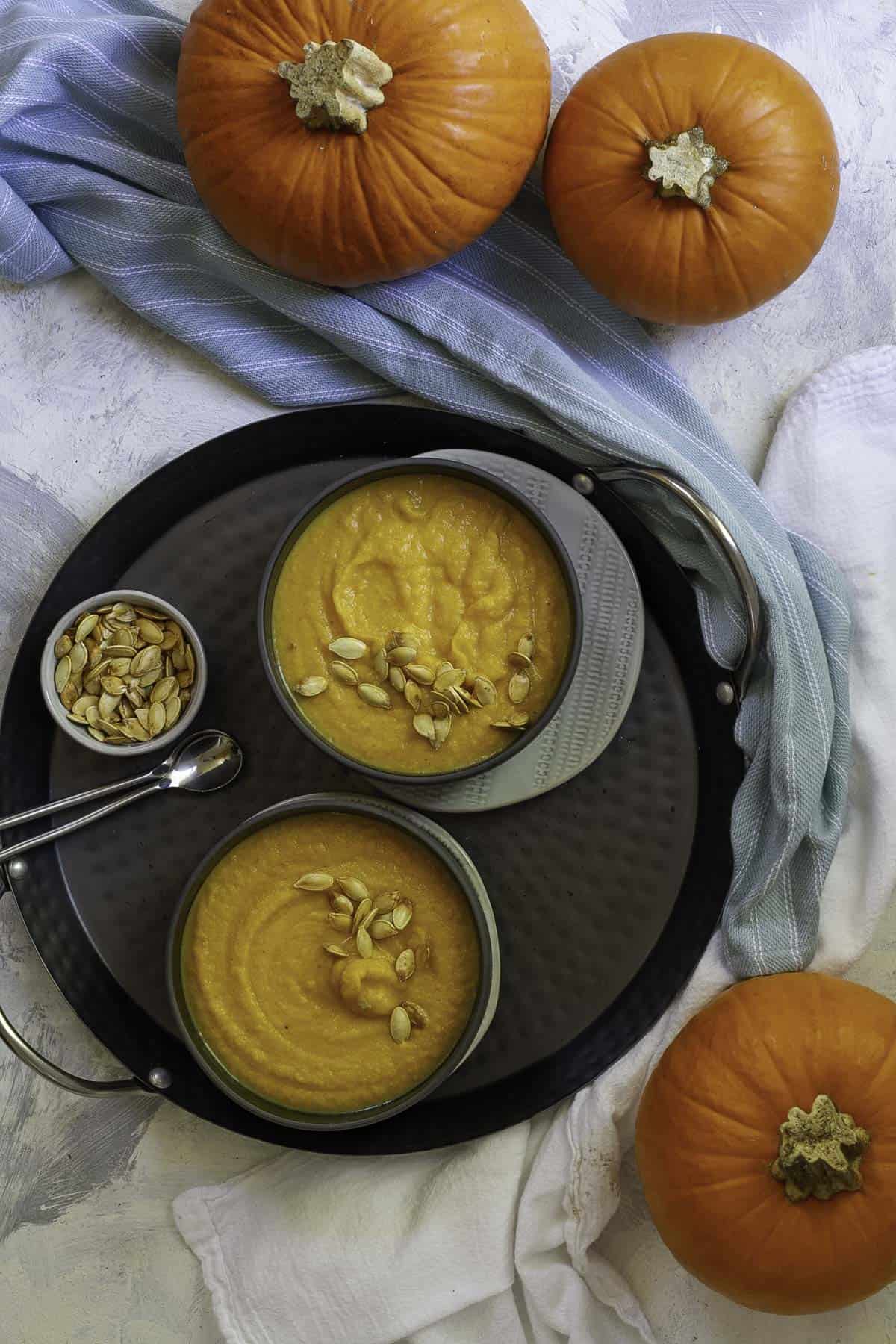 pumpkin soup in bowls.