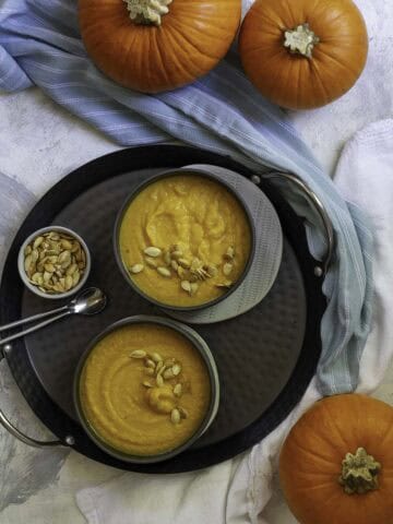 pumpkin soup in bowls.