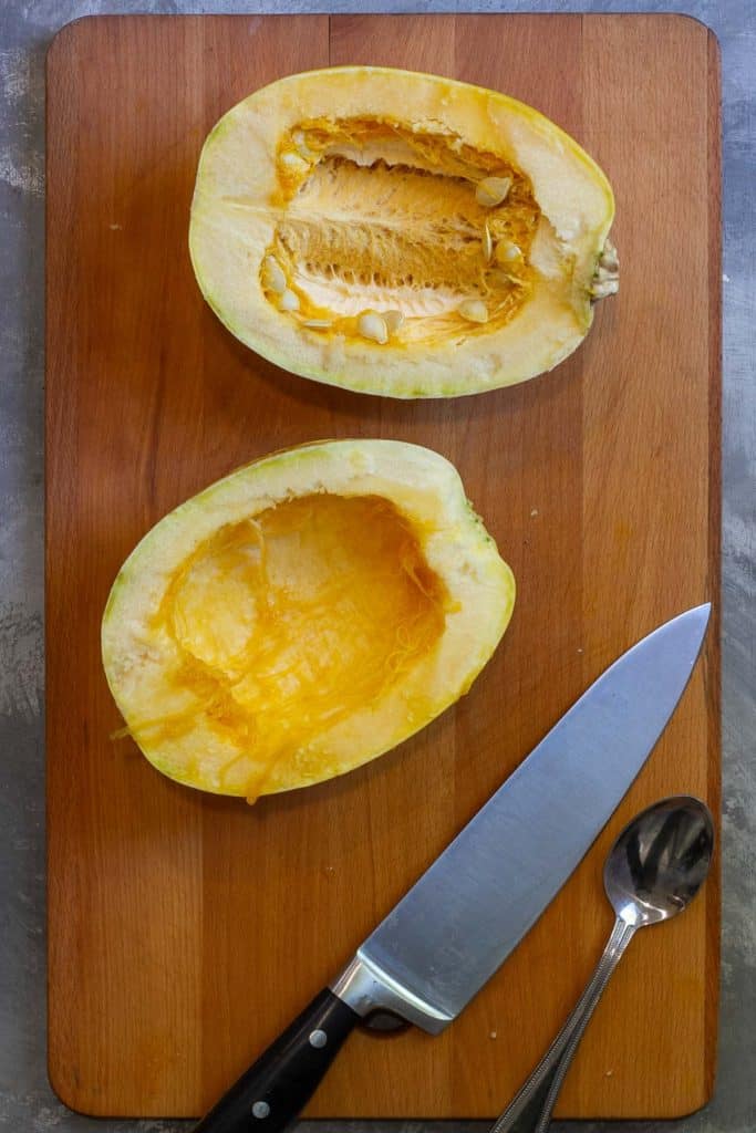 Cut Spaghetti Squash in Half + Scoop Out Seeds