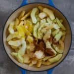 Add apple pie filling ingredients to a heavy-bottomed pot