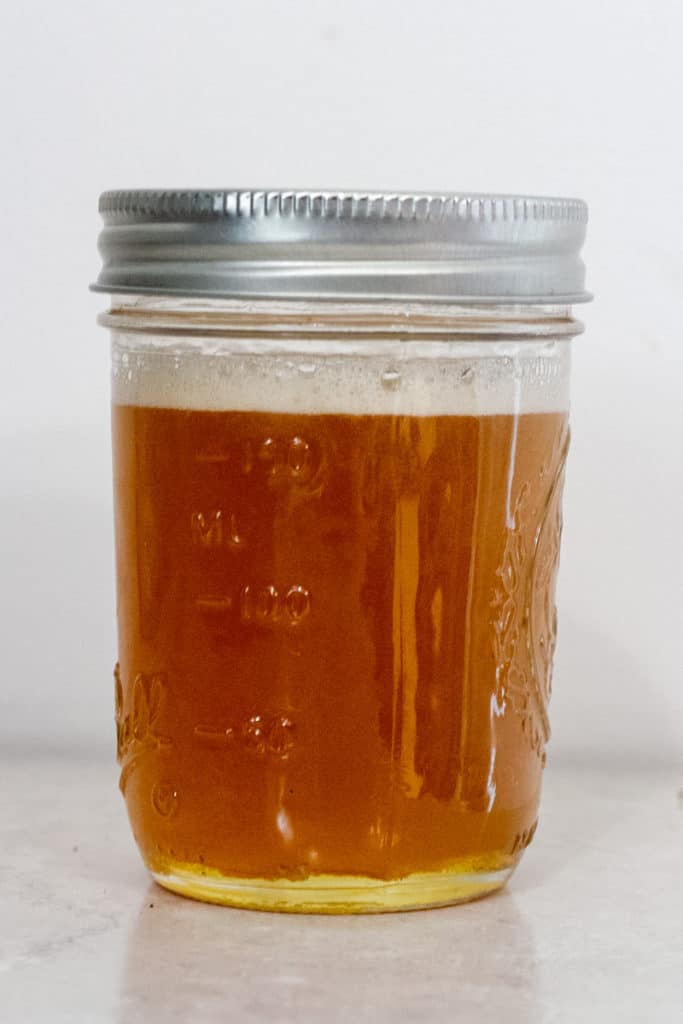 Shake the Homemade Cough Syrup Until Honey Incorporates