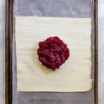 Top Brie with Cranberry Sauce